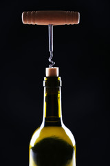 Bottle opener close-up, on dark background
