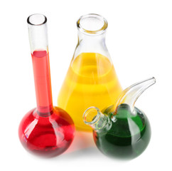 Different laboratory glassware with colorful liquid isolated