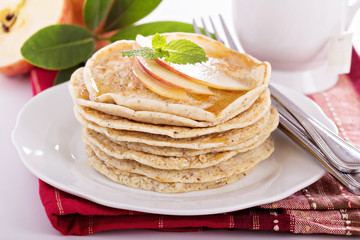 Stack of vegan pancakes with almond milk