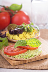 Vegan sandwich with avocado, vegetables and tofu