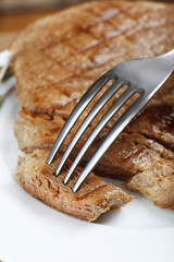 Delicious grilled meat on table, close-up