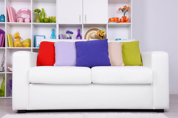 Modern interior design. White living room with sofa and