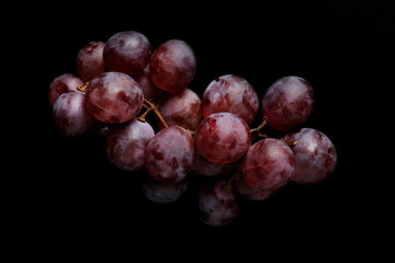 Grape on black background