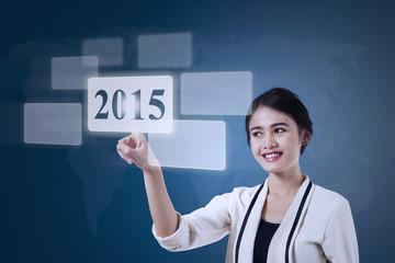 Businesswoman select number 2015