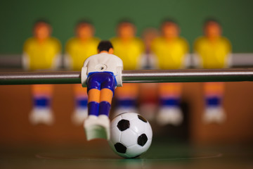 Toys players. foosball. soccer ball