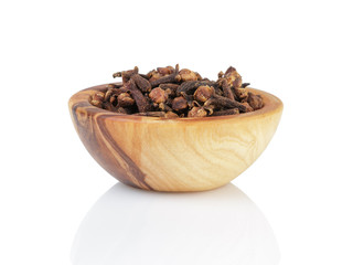 heap of dried cloves in bowl