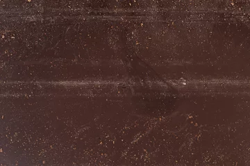 Selbstklebende Fototapeten texture of back of chocolate bar © GCapture