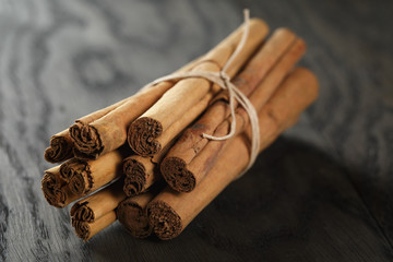 bunch of cinnamon sticks tied with twine