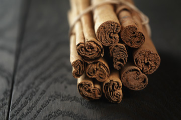 bunch of cinnamon sticks tied with twine