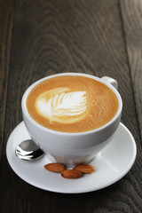 cup of fresh cappuccino with latte art