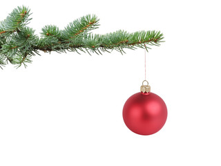 red satin glass ball hanging on christmas branch
