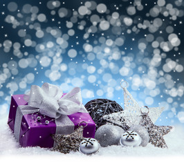 Purple Christmas package , gift of a silver ribbon. Jingle bells