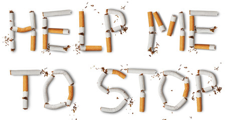 Text ''help me to stop'' made from broken cigarettes