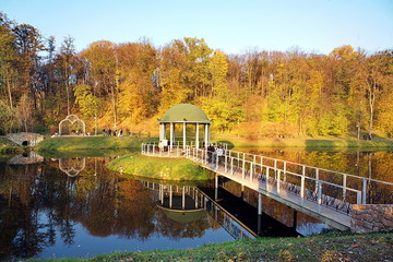 Fototapeta na wymiar Exotic Panorama view of lake with garden house