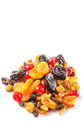 Mix variety of dried fruit over white background