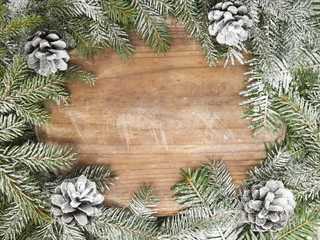 Fototapeta na wymiar Christmas background with decoration with cones and twigs