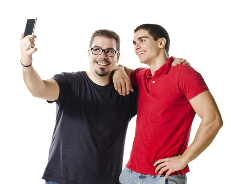 Friends taking selfie with smartphone