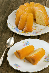 freshly cut cake on wooden surface