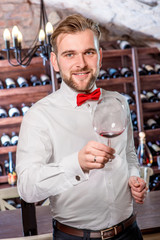 Sommelier in the wine cellar