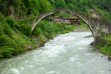 Fototapeta na wymiar Senyuva Bridge over the Firtina river in Northern Turkey