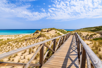 Fototapeta na wymiar Footbridge walkway to Cala Mesquida beach, Majorca island