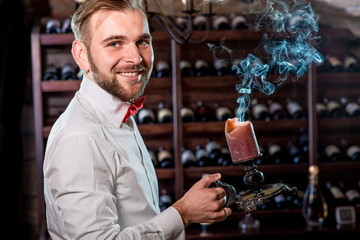 Sommelier in the wine cellar