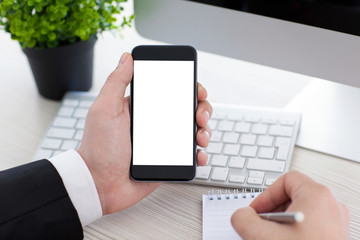 businessman holding phone with isolated screen and writing in no