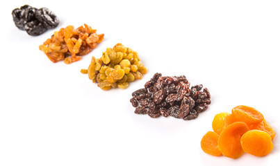 Mix dried fruit variety over white background