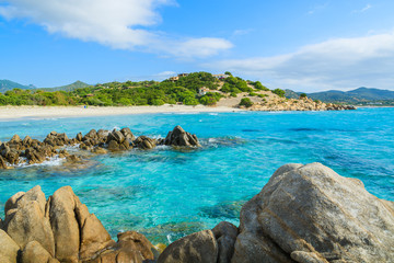 Rocks on Porto Giunco beach and turquoise sea water, Sardinia