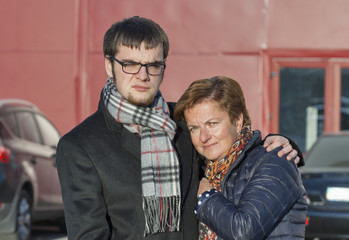 mother and son portrait in autumn clothing