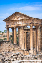 Obraz premium Dougga, Roman Ruins: A Unesco World Heritage Site in Tunisia