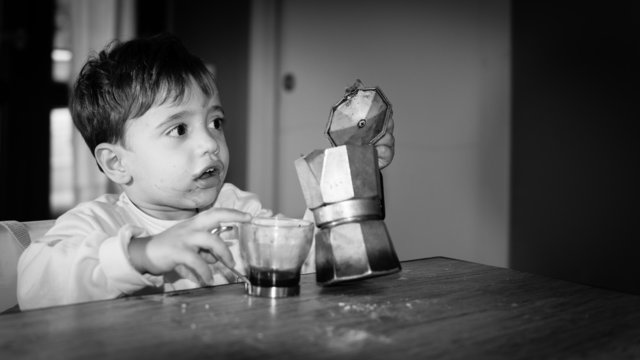 Cute Toddler Drinking Italian Coffee Made With Moka