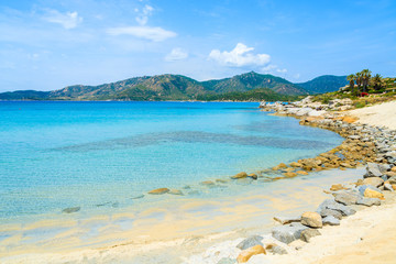 Fototapeta na wymiar Turquoise sea water of Spiaggia del Riso beach, Sardinia island