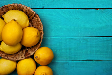 Lemons on the bright cyan background