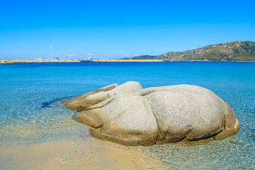 Stones in sea water on Spiaggia del Riso beach, Sardinia island