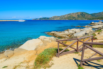 Fototapeta na wymiar Turquoise sea water and rocks, Spiaggia del Riso beach, Sardinia