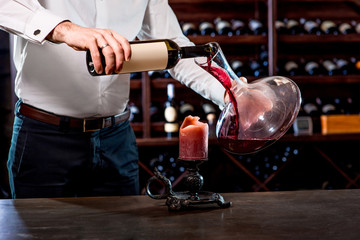 Sommelier in the wine cellar