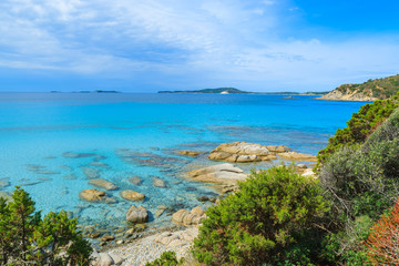 Fototapeta na wymiar Rocks in sea water of Punta Molentis bay, Sardinia island