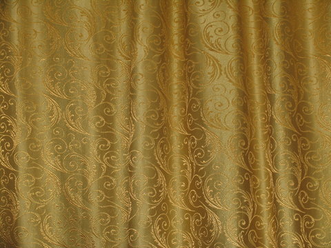 Golden texture of fabric with the waves
