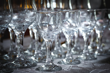 Glasses for drinks and cocktails at the festive table