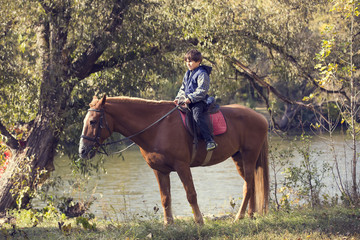 horse ride young guy autumn forest