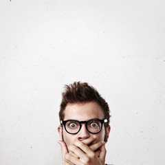Close-up portrait of a shocked man