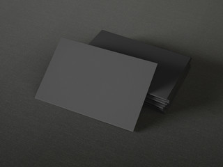 Black business cards on textile background