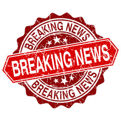 Breaking news red vintage stamp isolated on white background