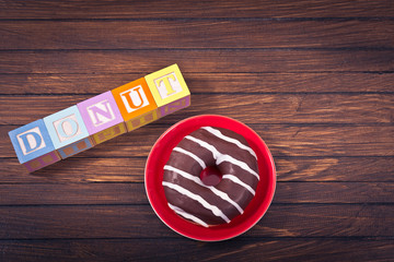 Donate at red plate and word donut in toy bricks