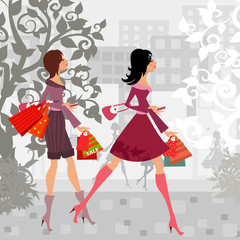 Fototapeta na wymiar fashion girls with purchase in city for your design