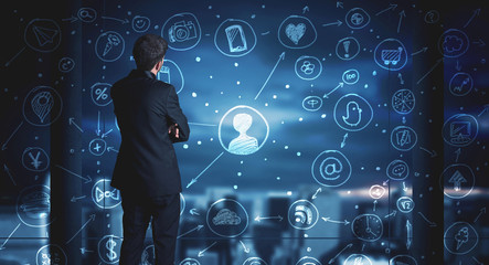 Businessman drawing social media connection scheme