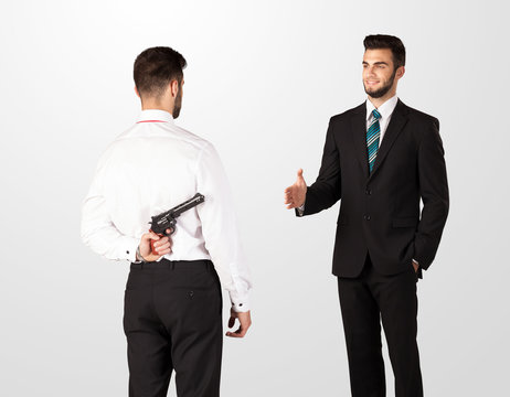 Two businessman shake hands
