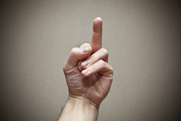 Middle finger as a sign of aggression - Fuck off