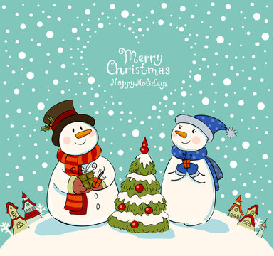 Loving couple of snowmen with gifts beside christmas tree.